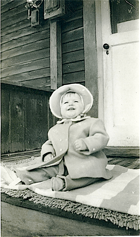 image for Pam Doan as a child on family house porch